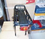 UTIL PARRILLA DE ALUMINIO PARA BICI. N. 26 AJUSTABLE, $18